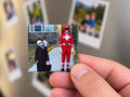 Hand holding custom 2x2 photo magnet