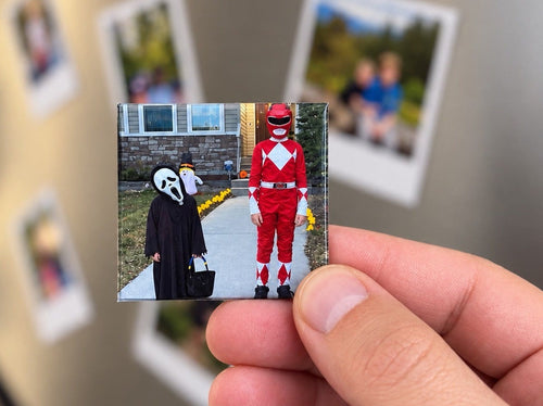 Hand holding custom 2x2 photo magnet