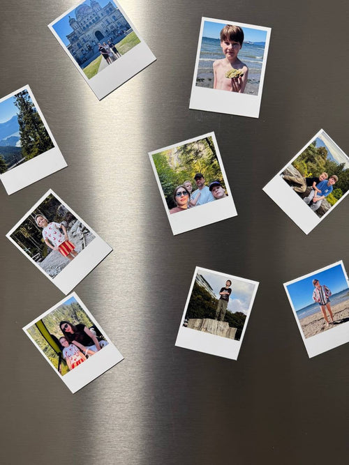 Soft custom Polaroid photo magnets on stainless fridge